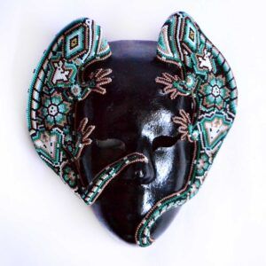 Masque à iguanes dans l'art huichol : tradition et symbolisme